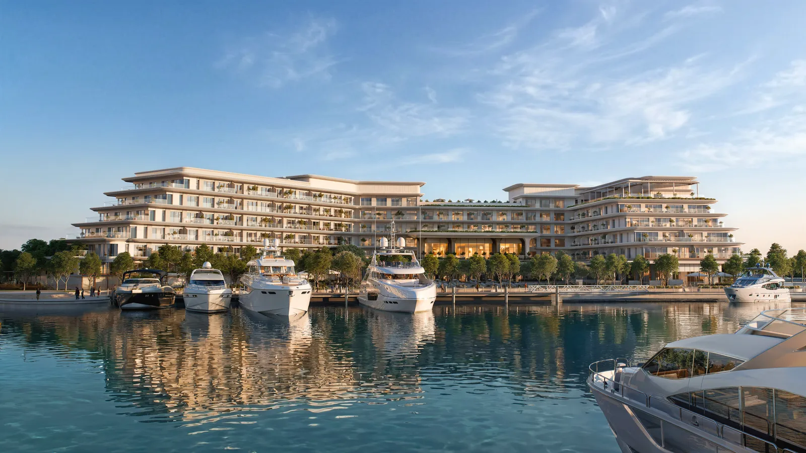 The Bristol Residences seen from Ramhan Marina, with yachts moored below the terraced residences, developer render
